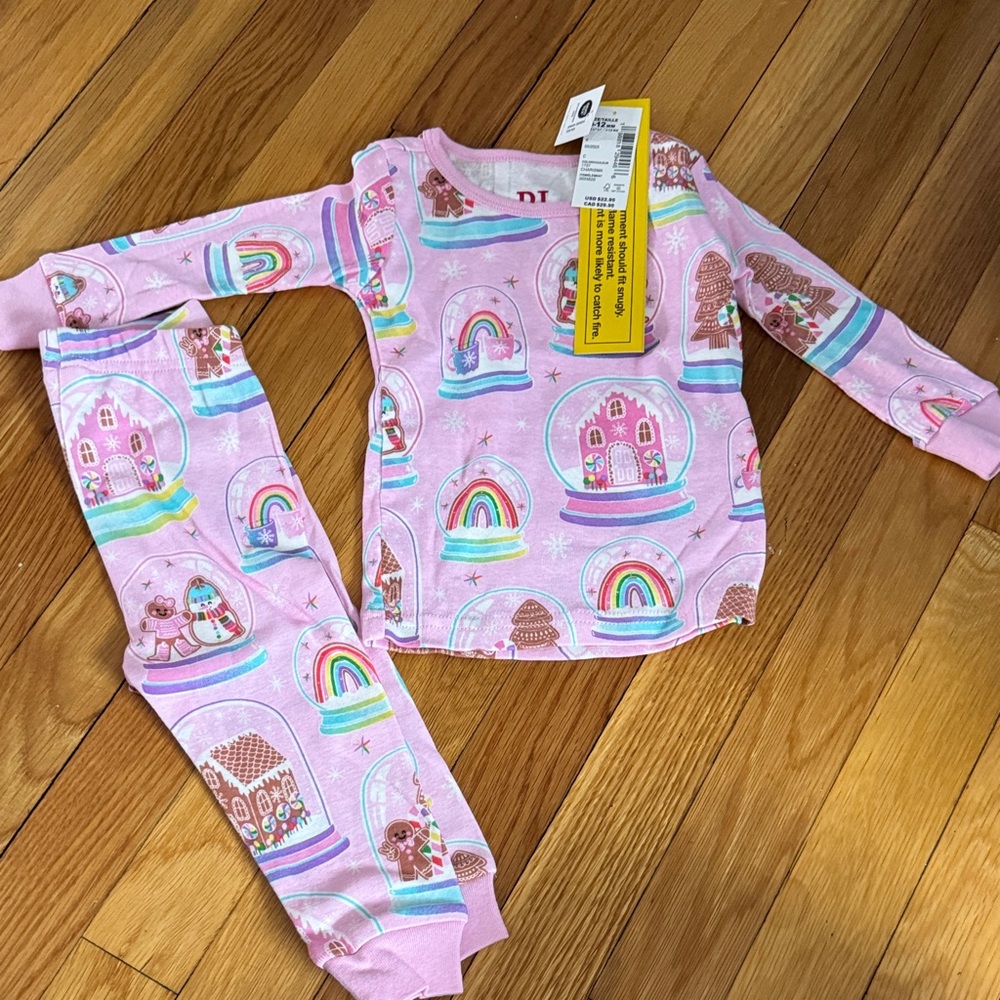 Children’s Place pink holiday snow globe pajamas